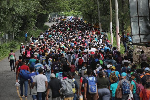 Migrants break through gates at Guatemala Mexico Border